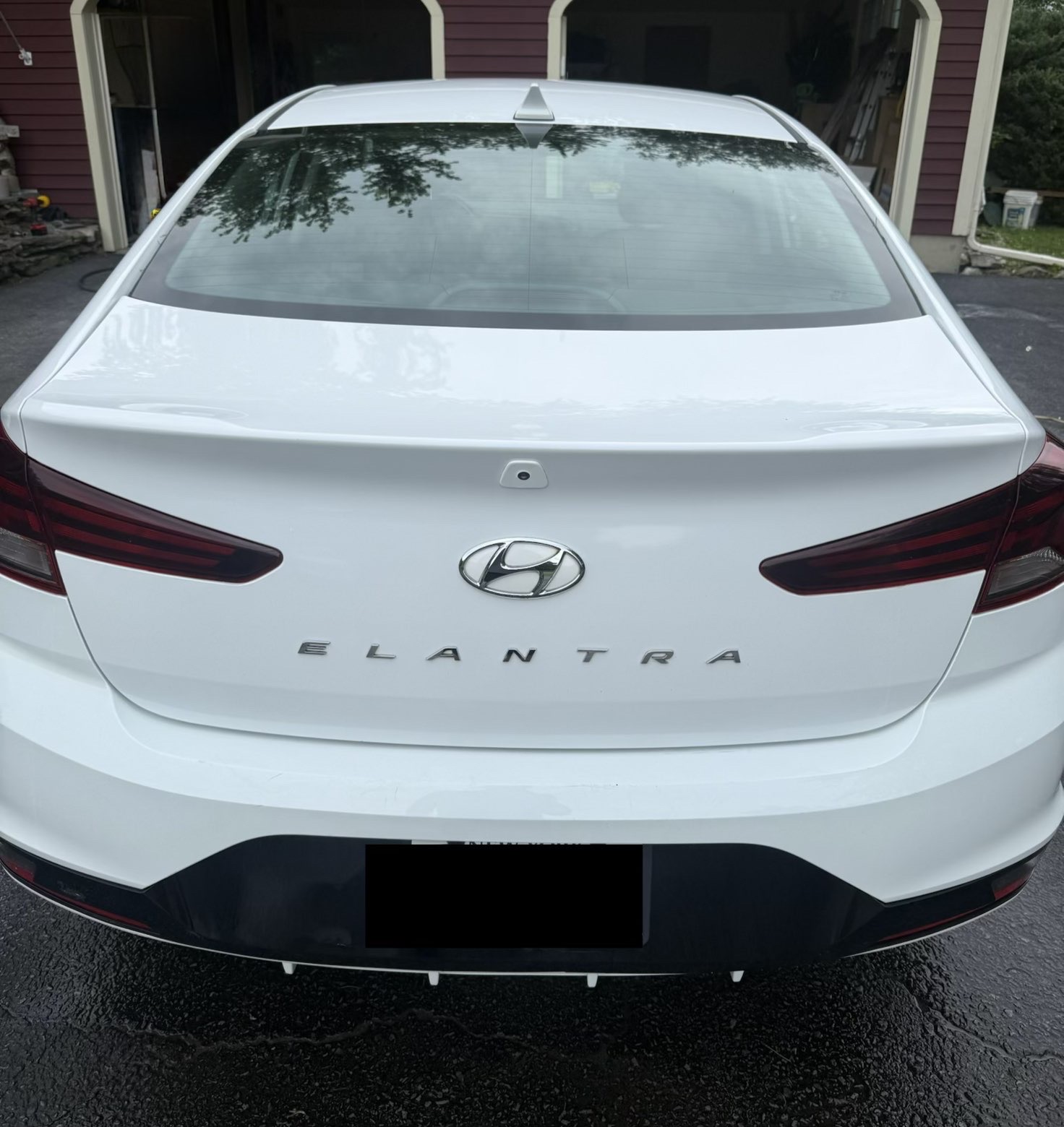 Spotless sedan rear paint and glass